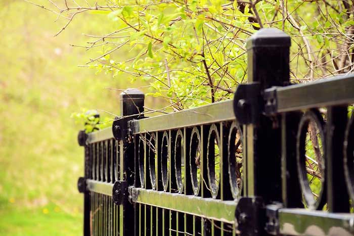 Close-up of an aluminum fence installed for a residential home in Palm Beach County, FL
